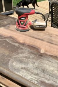 Sanding the dresser.