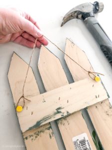Spring DIY picket fence decor how to hang
