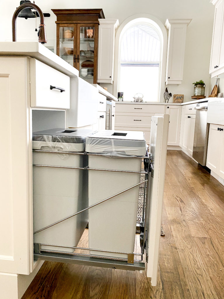 space saving garbage can pullouts to organize your kitchen
