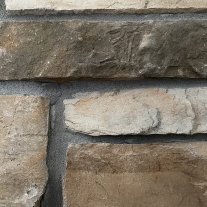 How to Whitewash a Stone Fireplace - Super Easy Project - Designs By Karan