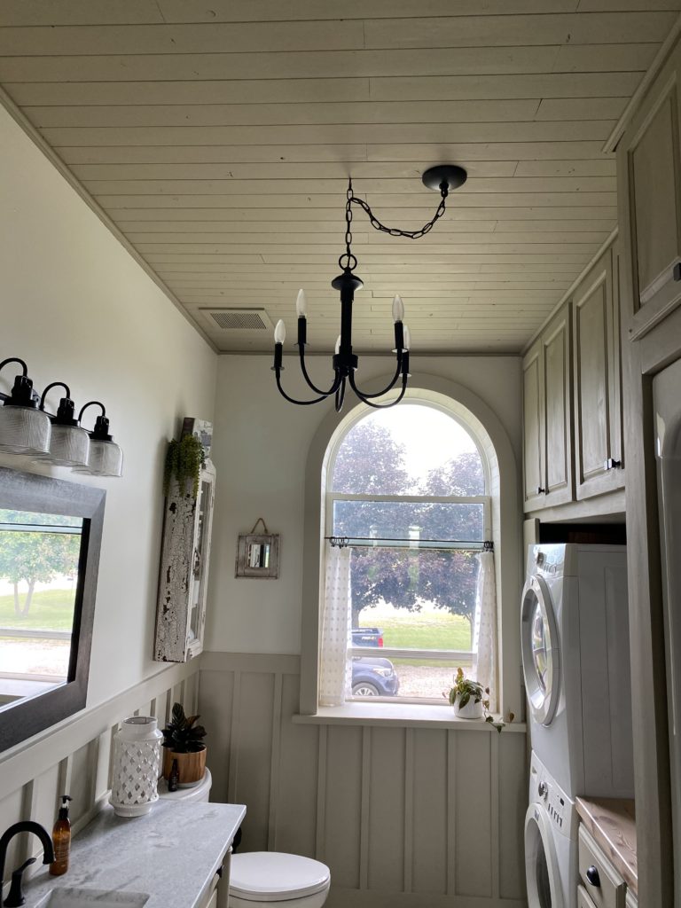 Painted wooden ceiling in farmhouse bathroom update.